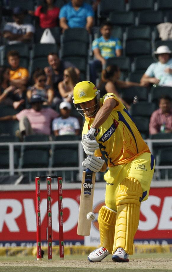 Chennai Super Kings batsman Faf Du Plessis plays a shot from Sydney Sixers bowler Josh Hazlewood, unseen, during the Champions League Twenty20 cricket match at the Wanderers Stadium, Johannesburg.