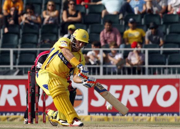 Chennai Super Kings batsman Michael Hussey plays a shot from Sydney Sixers bowler Stephen O'Keefe, unseen, during the Champions League Twenty20 cricket match at the Wanderers Stadium, Johannesburg, South Africa.