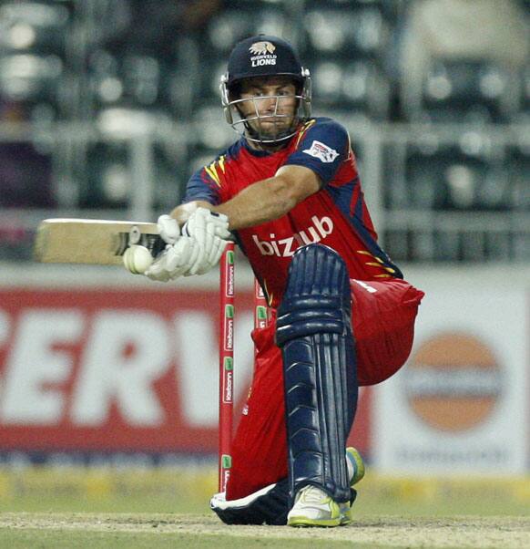 Highveld Lions batsman Neil McKenzie plays a shot during their Champions League Twenty20 cricket match against the Mumbai Indians at the Wanderers Stadium, in Johannesburg, South Africa.