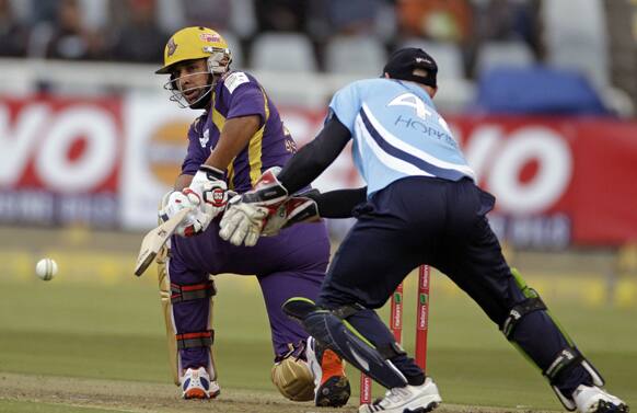 Kolkata Knight Rider Manvinder Bisla plays a shot during the Champions League Twenty20 cricket game against Auckland Aces in Cape Town.