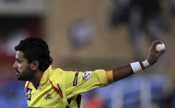 Chennai Supper Kings's Murali Vijay celebrates after taking a catch to dismiss Mumbai Indians batsman Dwayne Smith, unseen, during their Champions League Twenty20 cricket match at the Wanderers Stadium in Johannesburg.