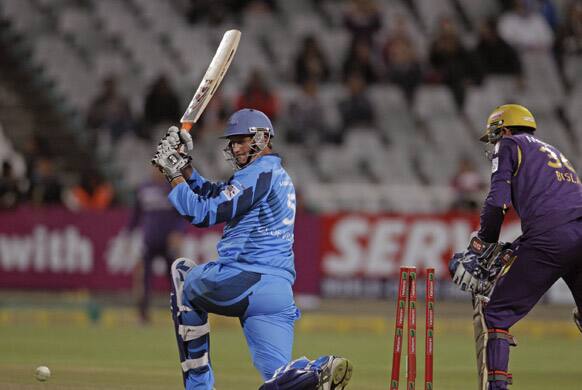 Titans Cornelius de Villiers, left, loses his wicket against Kolkata Knight Riders during a Champions League Twenty20 game in Cape Town, South Africa.