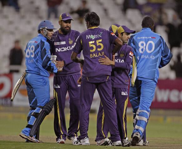 Kolkata Knight Riders, center, react as they win against the Titans during a Champions League Twenty20 game in Cape Town, South Africa.