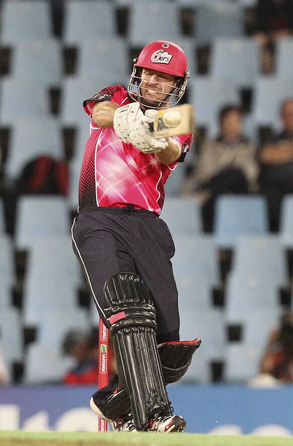 Sydney Sixers's batsman Ben Rohrer plays a shot off Titans's bowler Ethy Mbhalati, unseen, during the semi final of their Champions League Twenty20 cricket match at the Centurion Stadium in Pretoria, South Africa.