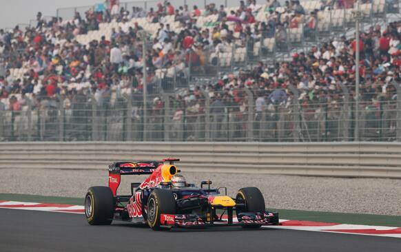 Red Bull driver Sebastian Vettel of Germany steers his car during the Indian Formula One Grand Prix at the Buddh International Circuit in Noida, on the outskirts of New Delhi.