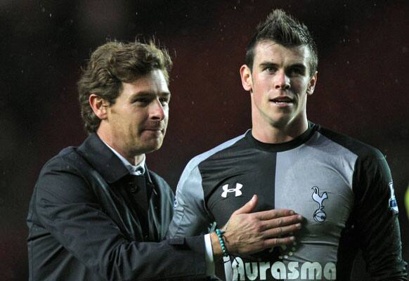 Tottenham Hotspur's manager Andre Villas Boas celebrates with goalscorer Gareth Bale, right, at the end of the match during an English Premier League match at St Mary's Stadium.