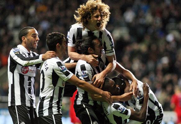 Newcastle United's Sammy Ameobi, second right, celebrates his goal with his teammates during their English Premier League soccer match against West Bromwich Albion at St James' Park.