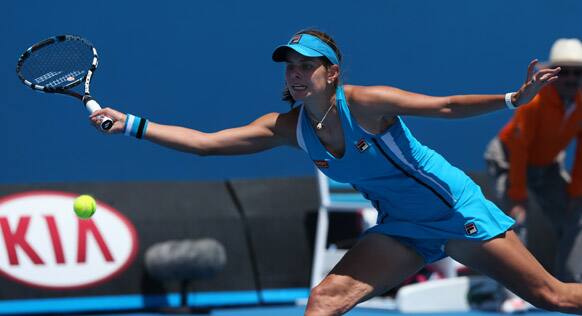 Germany's Julia Georges reaches for a forehand return to Russia's Vera Dushevina during their first round match at the Australian Open tennis championship in Melbourne.