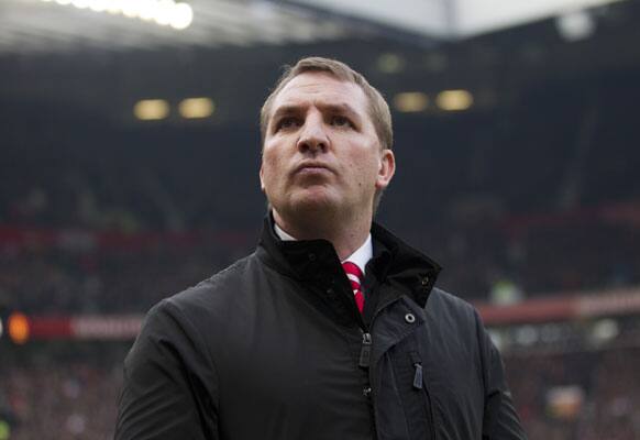 Liverpool manager Brendan Rodgers takes to the touchline prior to the English Premier League soccer match against Manchester United at Old Trafford Stadium, Manchester, England, Sunday Jan. 13, 2013.