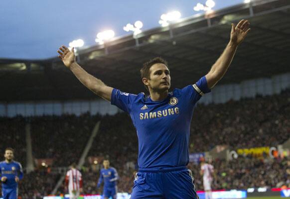 Chelsea's Frank Lampard celebrates after scoring against Stoke City during their English Premier League soccer match at the Britannia Stadium, Stoke, England, Saturday Jan. 12, 2013.