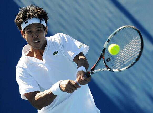 India's Somdev Devvarman hits a backhand return to Germany's Bjorn Phau during their first round match at the Australian Open tennis championship in Melbourne.