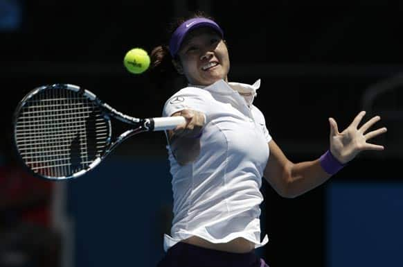 China's Li Na hits forehand return to to Olga Govortsova of Belarus during their second round match at the Australian Open tennis championship.