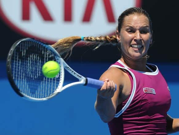 Slovakia's Dominika Cibulkova makes a forehand return to Russia's Valeria Savinykh during their second round match at the Australian Open tennis championship.