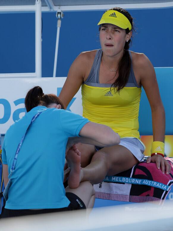 Serbia's Ana Ivanoic has treatment from a trainer during her second round match against Taiwan's Chan Yung-Jan at the Australian Open tennis championship in Melbourne.