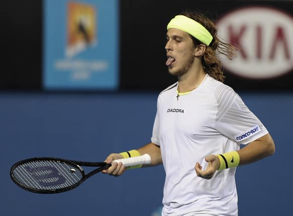 Slovakia's Lukas Lacko reacts during his loss to Serbia's Janko Tipsarevic in their second round match at the Australian Open tennis championship.