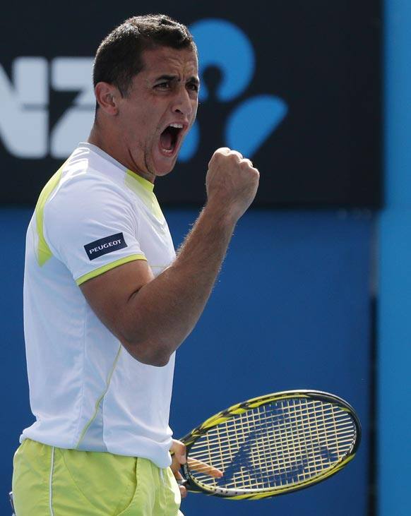 Spain's Nicolas Almagro celebrates during his win over Poland's Jerzy Janowicz at the Australian Open tennis championship in Melbourne.