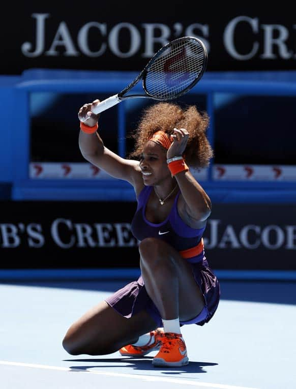 Serena Williams of the US celebrates reacts to a point during her third round match against Japan's Ayumi Morita at the Australian Open tennis championship in Melbourne.