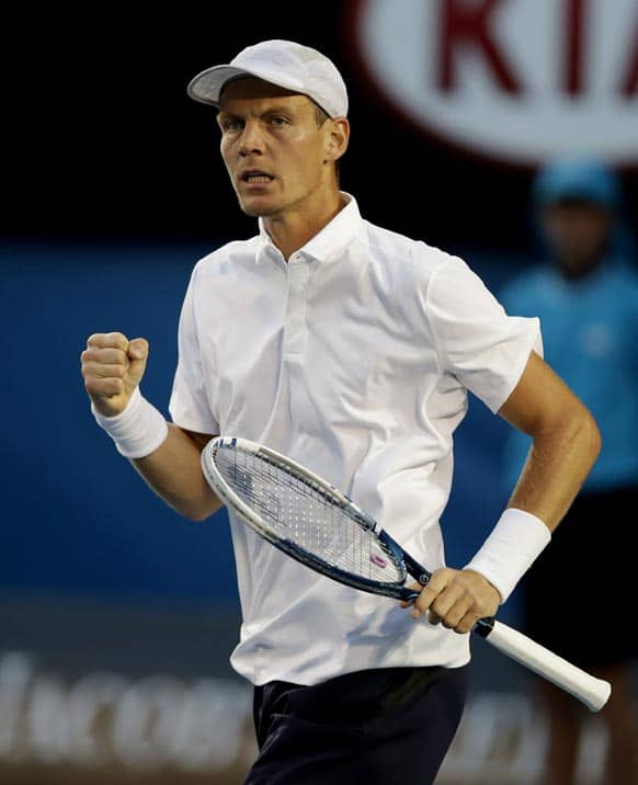 Tomas Berdych of the Czech Republic reacts during his quarterfinal match against Serbia's Novak Djokovic at the Australian Open tennis championship in Melbourne.