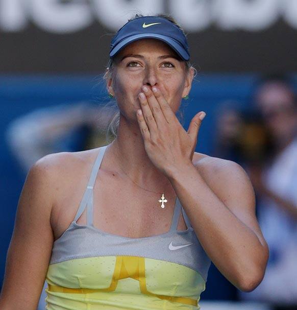 Russia's Maria Sharapova blows kisses to the crowd after her quarterfinal win over compatriot Ekaterina Makarova at the Australian Open tennis championship in Melbourne.