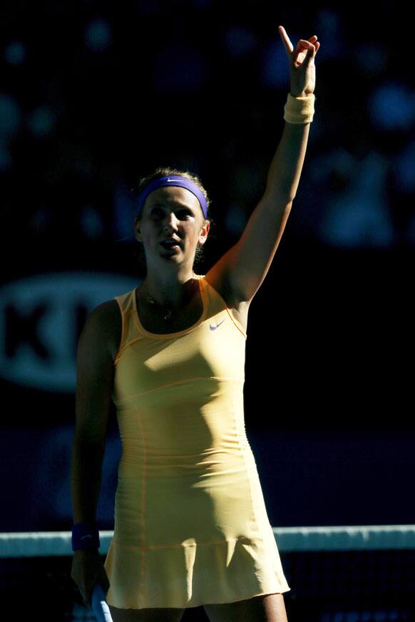 Victoria Azarenka of Belarus waves after defeating Sloane Stephens of the US in their semifinal match at the Australian Open tennis championship.