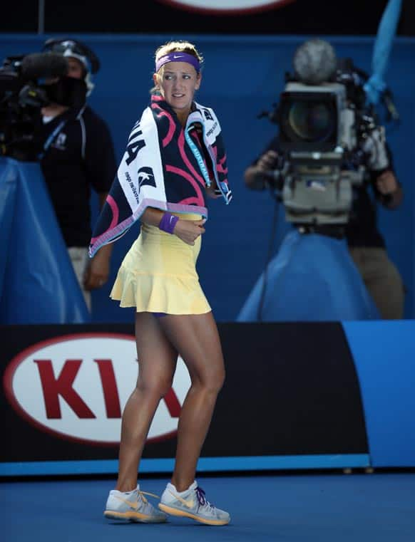 Victoria Azarenka of Belarus walks off the court to take a medical time out during her semifinal match against Sloane Stephens of the US at the Australian Open tennis championship in Melbourne, Australia.