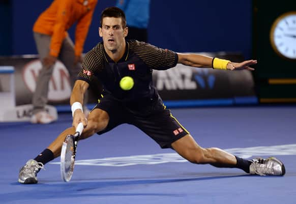 Serbia's Novak Djokovic makes a forehand return to Britain's Andy Murray during the men's final at the Australian Open tennis championship in Melbourne.