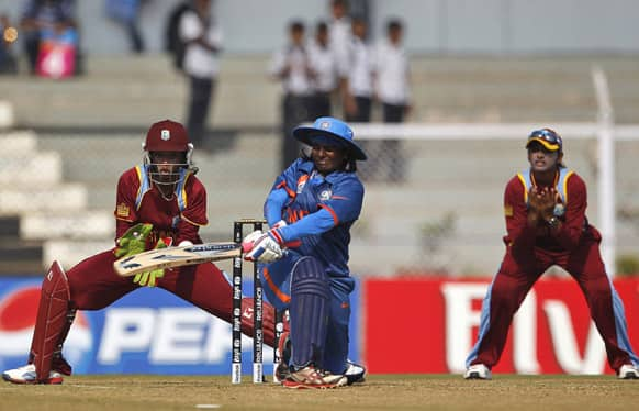 India’s Thirush Kamini Murugesan plays a shot against West Indies during the opening cricket match of the ICC Women's World Cup in Mumbai.