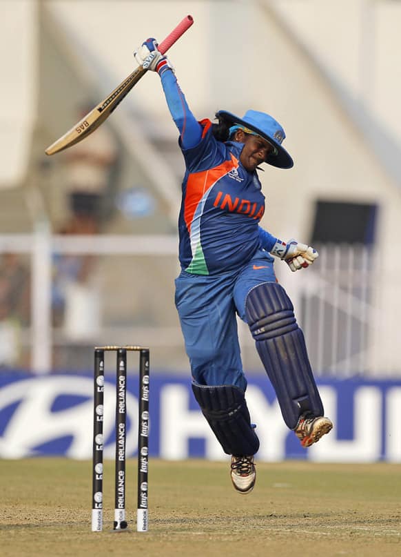 India’s Thirush Kamini Murugesan celebrates after scoring a century against West Indies during the opening match of the ICC Women's World Cup cricket in Mumbai.