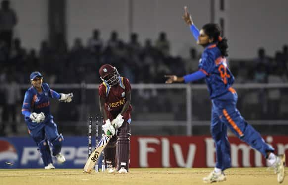 Indian cricketer Niranjan Nagarajan celebrates the dismissal of West Indies' Shemaine Campbelle during the opening match of the ICC Women's World Cup cricket in Mumbai.