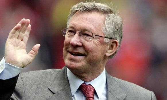 This is a Sunday, May 22, 2011. file photo of Manchester United's manager Alex Ferguson as he waves to fans ahead of their English Premier League soccer match against Blackpool at Old Trafford.