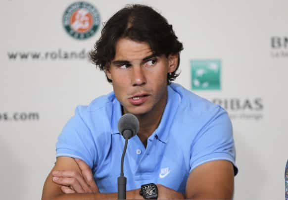 Spain's Rafael Nadal listens to a reporter during a press conference for the 2013 French Open tennis tournament, at Roland Garros stadium in Paris.