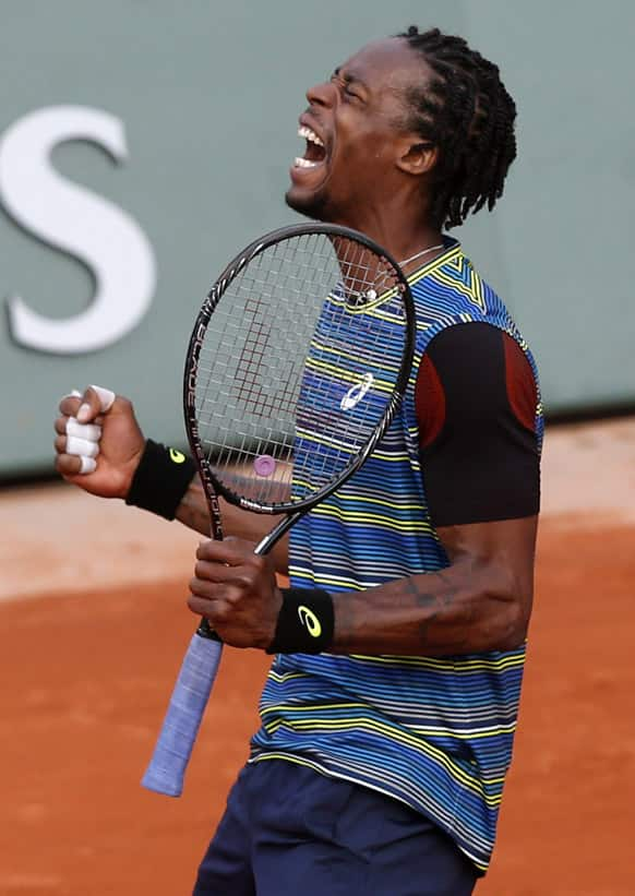 France's Gael Monfils reacts shortly before defeating Czech Republic's Tomas Berdych during their first round match of the French Open tennis tournament at the Roland Garros stadium in Paris.