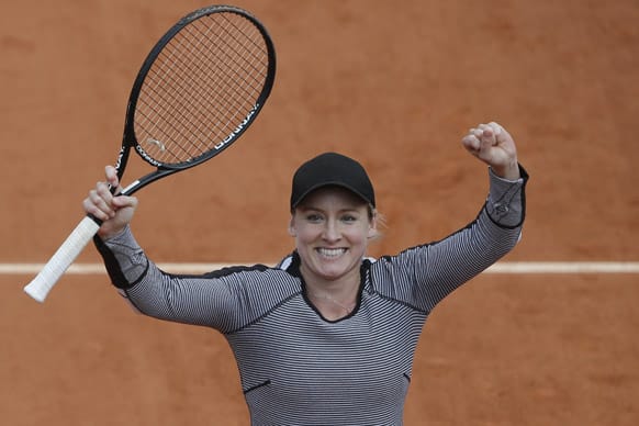 Bethanie Mattek-Sands of the US celebrates defeating China's Li Na in their second round match at the French Open tennis tournament, at Roland Garros stadium in Paris. Mattek-Sands won in three sets 6-1, 5-7, 6-4.