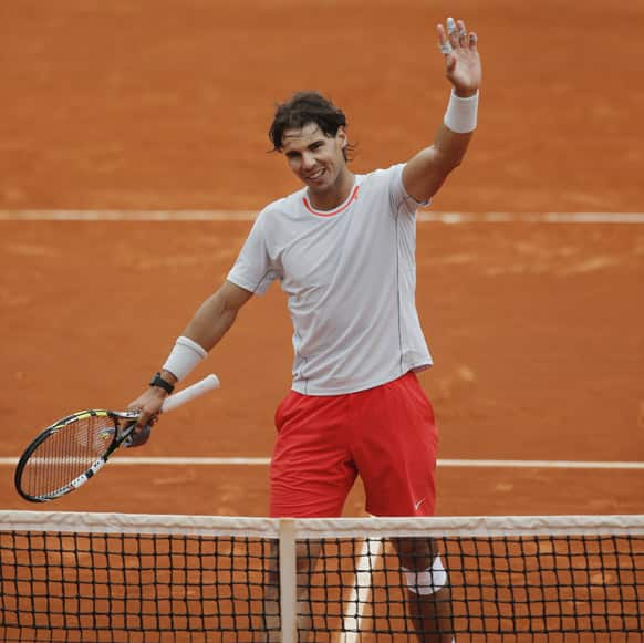 Spain's Rafael Nadal celebrates defeating Slovakia's Martin Klizan in their second round match at the French Open tennis tournament, at Roland Garros stadium in Paris. Nadal won in four sets 4-6, 6-3, 6-3, 6-3.