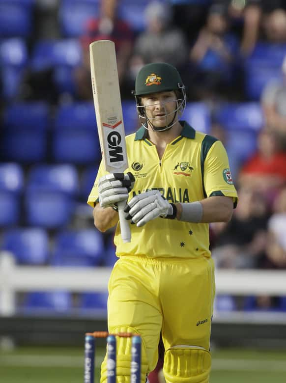 Australia's Shane Watson, looks up at the small crowd after scoring his century against the West Indies during a warm up cricket match for the upcoming ICC Championship Trophy, in Cardiff, Wales.