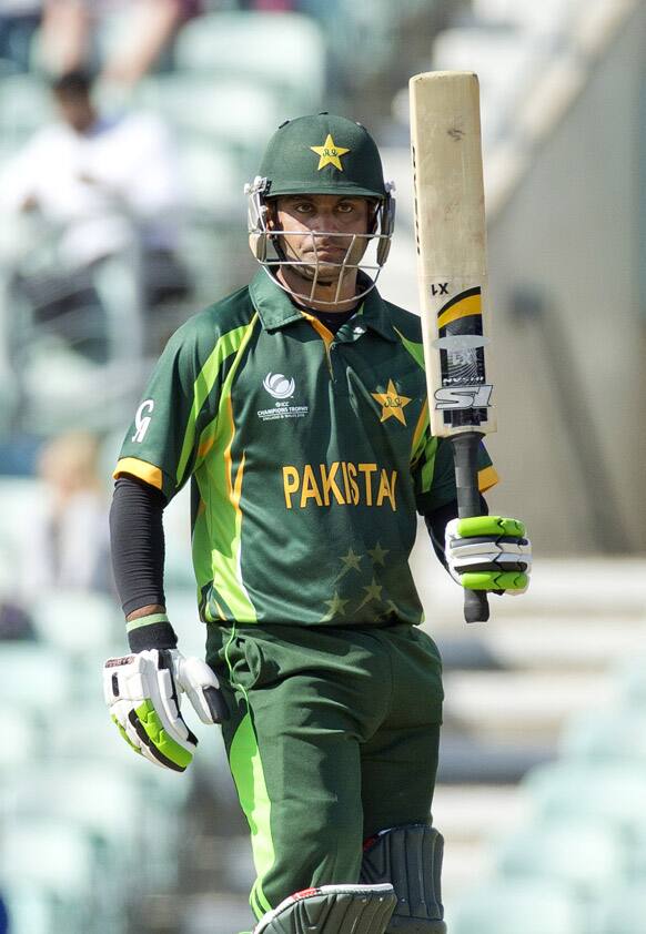 Pakistan's Mohammad Hafeez celebrates reaching 50 runs during a warm up cricket match for the upcoming ICC Championship Trophy between Pakistan and South Africa at The Oval cricket ground in London.