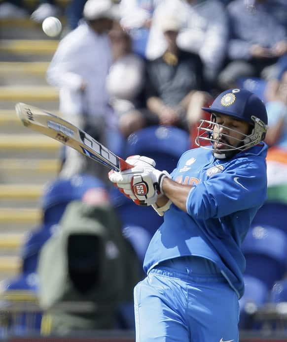 Shikhar Dhawan bats during the group stage ICC Champions Trophy cricket match against South Africa in Cardiff, Wales.