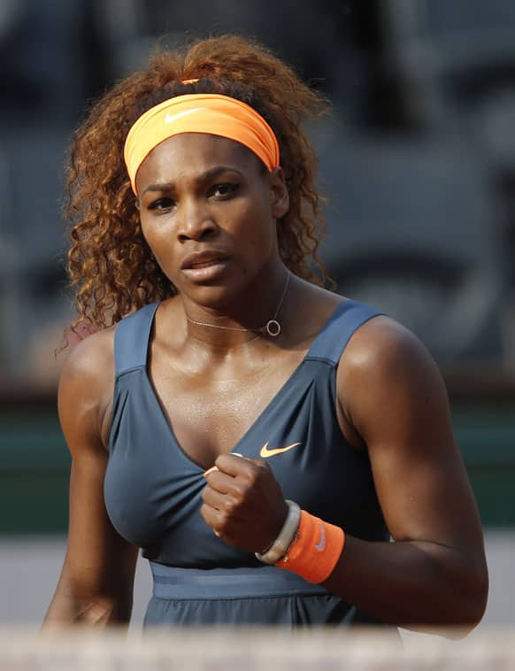 Serena Williams, of the US, reacts as she plays Italy’s Sara Errani during their semifinal match of the French Open tennis tournament at the Roland Garros stadium, in Paris.