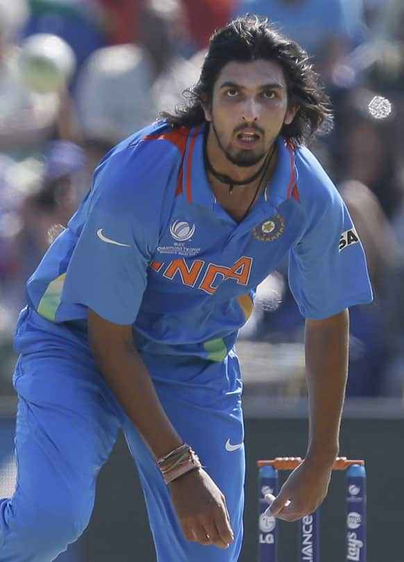 Ishant Sharma looks down the wicket after he bowls to South Africa's AB de Villiers during their group stage ICC Champions Trophy cricket match in Cardiff, Wales.