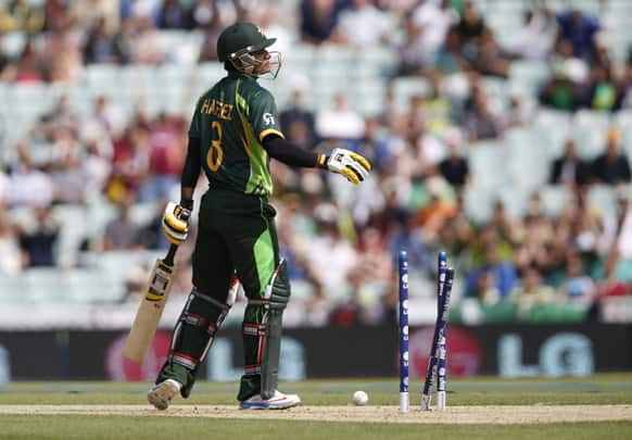 Pakistan's Mohammad Hafeez reacts to being bowled by West Indies' Kemar Roach during their ICC Champions Trophy group B cricket match at the Oval cricket ground in London.