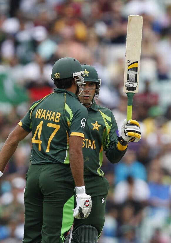 Pakistan's Misbah-ul Haq reacts to his 50 runs against West Indies during their ICC Champions Trophy group B cricket match at the Oval cricket ground in London.