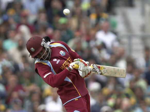 Chris Gayle avoids a bouncer from Pakistan's Wahab Riaz during their ICC Champions Trophy group B cricket match at the Oval cricket ground in London.