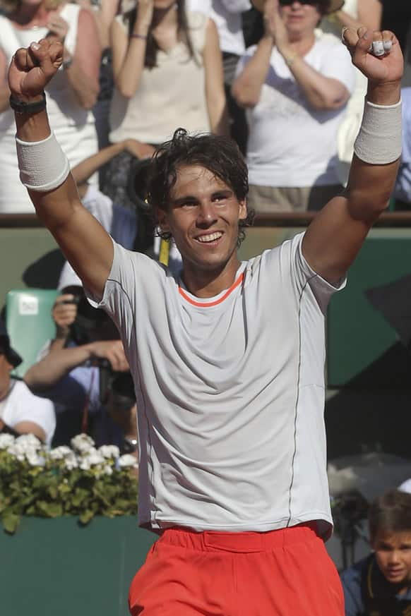 Spain's Rafael Nadal celebrates winning against Serbia's Novak Djokovic in their semifinal match at the French Open tennis tournament, at Roland Garros stadium in Paris. Nadal won in five sets 6-4, 3-6, 6-1, 6-7, 9-7. 