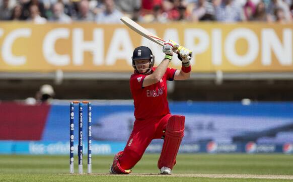 England's Ian Bell watches the path of the ball after hitting a shot during the ICC Champions Trophy group A cricket match between England and Australia at Edgbaston cricket ground in Birmingham, England.