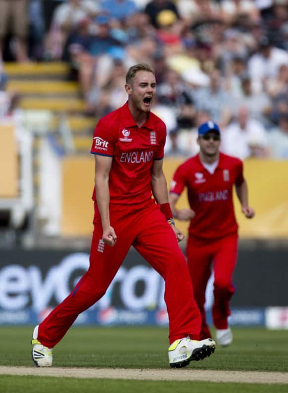 England's Stuart Broad celebrates taking the wicket of Australia's David Warner, not pictured, during the ICC Champions Trophy group A cricket match between England and Australia at Edgbaston cricket ground in Birmingham.