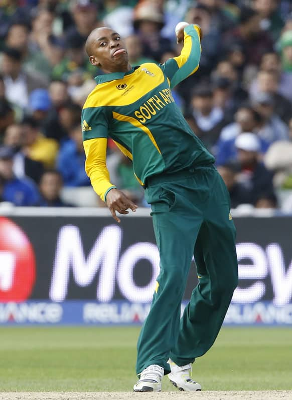 South Africa's Aaron Phangiso bowls during an ICC Champions Trophy cricket match between Pakistan and South Africa at Edgbaston in Birmingham.