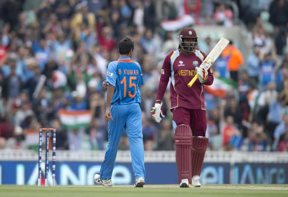 West Indies' Chris Gayle walks off the field of play after losing his wicket off the bowling of India's Bhuvneshwar Kumar during the ICC Champions Trophy group B cricket match between India and West Indies at The Oval cricket ground in London.