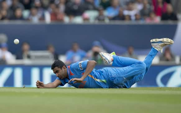 Ravichandran Ashwin fails to take a catch off his own bowling during the ICC Champions Trophy group B cricket match between India and West Indies at The Oval cricket ground in London.