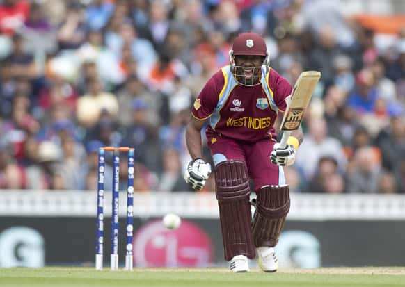 West Indies' Dwayne Bravo gives a shout to his batting partner during the ICC Champions Trophy group B cricket match between India and West Indies at The Oval cricket ground in London.