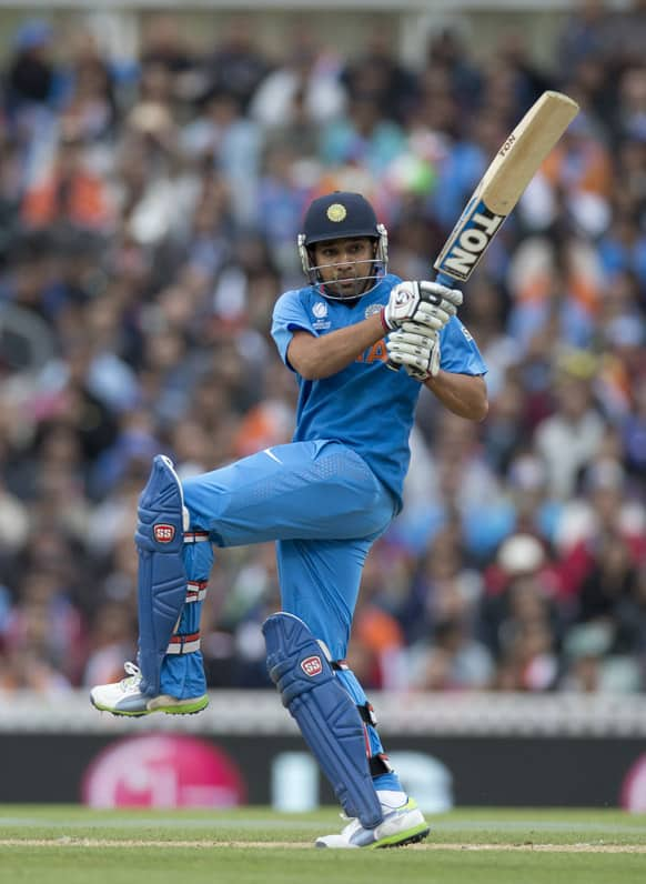 Rohit Sharma hits a shot during the ICC Champions Trophy group B cricket match between India and West Indies at The Oval cricket ground in London.